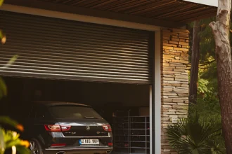 garage door with car parked front it